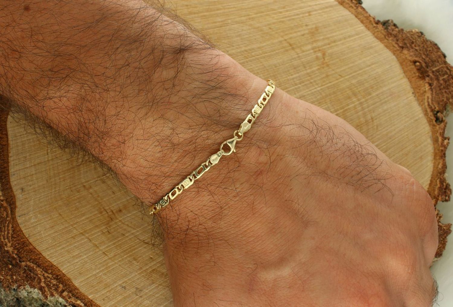 Złota bransoletka męska próby 585, splot Cartier 3,5 mm, długość 21 cm, waga 6,00 g. Model DIA-BRA-13589-585 z zapięciem na karabińczyk. Klasyczny, elegancki prezent dla mężczyzny.1.jpg